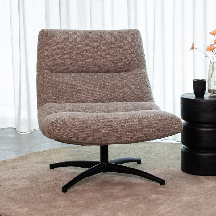 Draaifauteuil David in grijs bouclé in een woonkamer