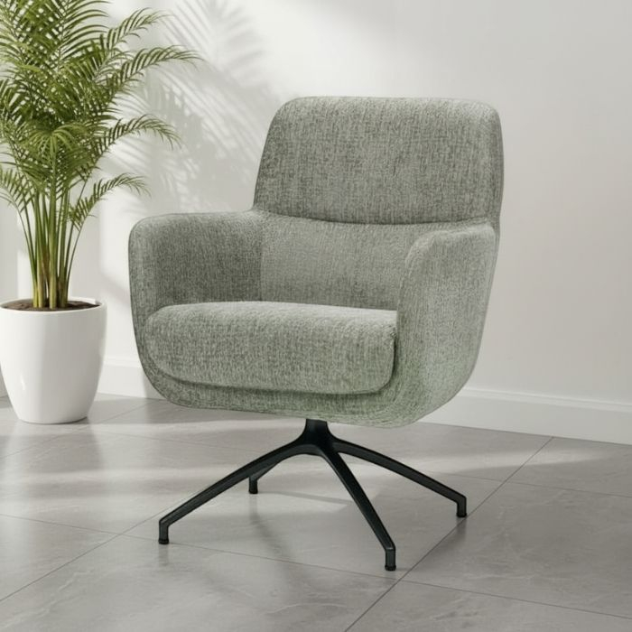 Fauteuil Mares met zwarte kruispoot. 