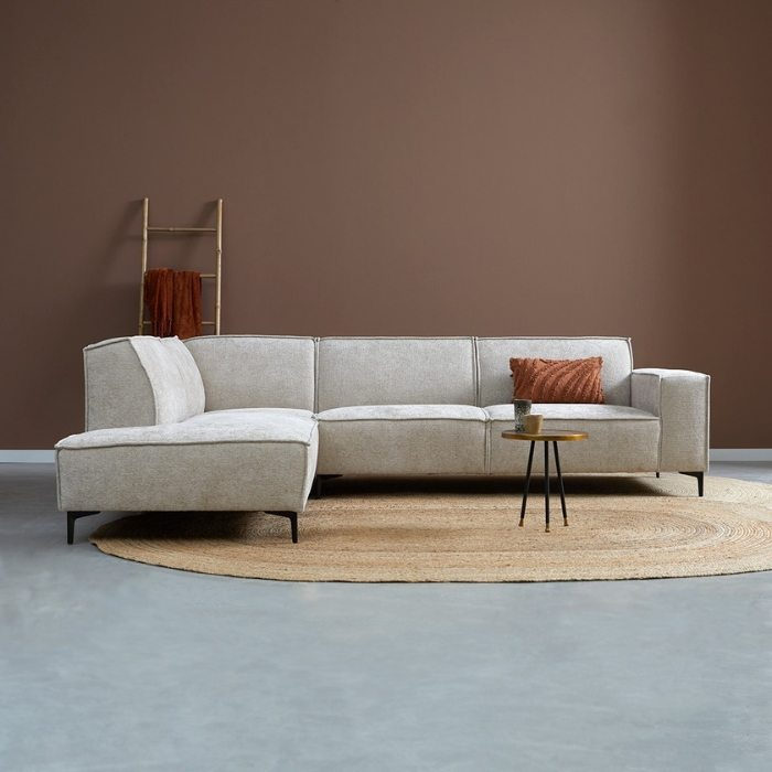 Hoekbankstel in beige stof met ottaman links. Model River van Pep