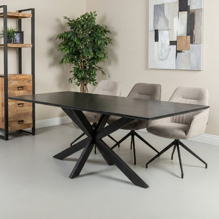 Zwarte eettafel langwerpig met spinpoot.