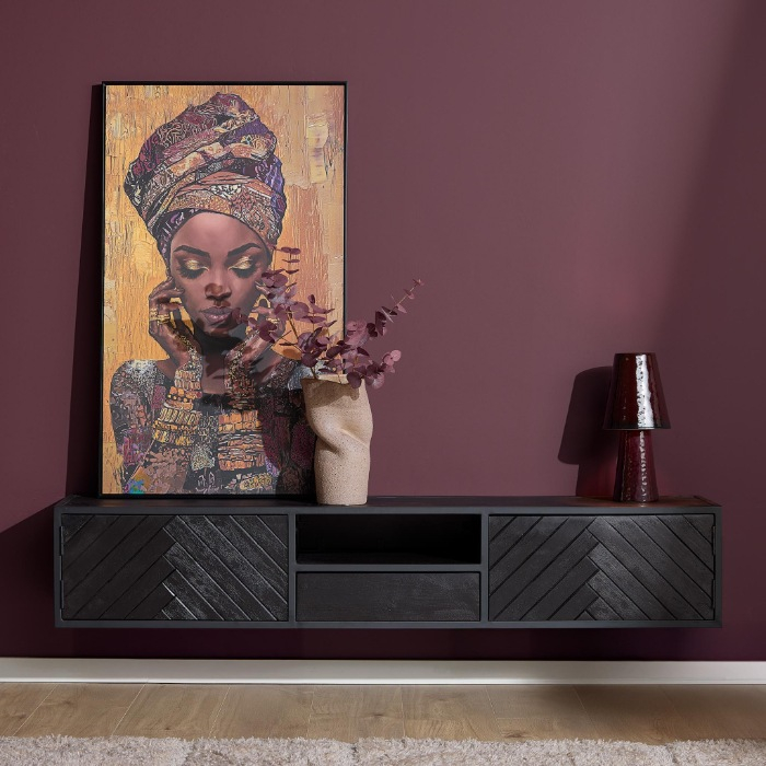 Zwevend tv-meubel New York zwart mangohout onder een kleurrijk schilderij