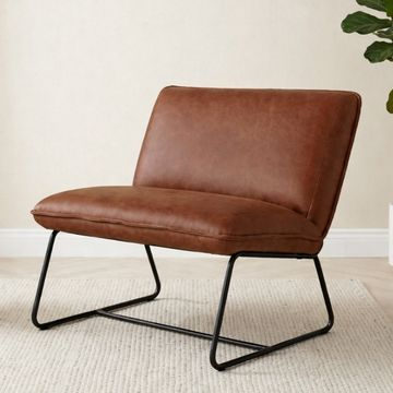 fauteuils industrieel in leer in de kleur cognac.