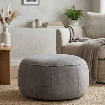 Poef donkergrijs rond. 