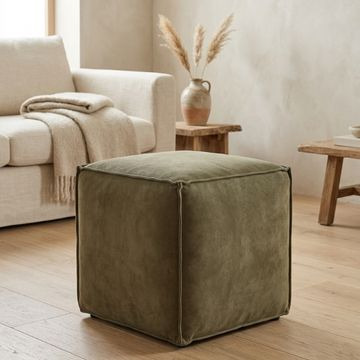 Vierkante poef in het groen. 