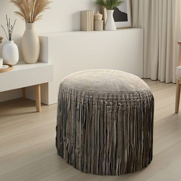 Ronde poef donkergrijs leer. Bohemian style.