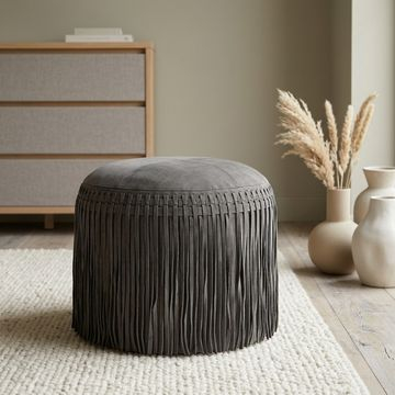 Ronde poef donkergrijs leer. Bohemian style.