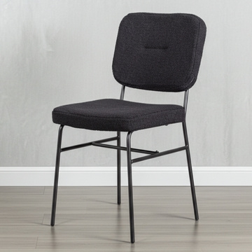 Zwarte eetkamerstoel in Teddy stof.