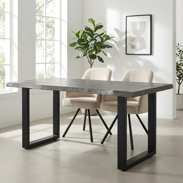 Grijze boomstamtafel 160 cm licht gezandstraald met zwarte U-poten.