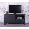 TV meubel industrieel van mangohout. Kleur: zwart. 120 cm breed. Met 1 schuifdeur, een open vakje met een lade er onder. 