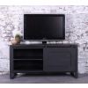 tv meubel mangohout zwart. 120 cm breed. met 1 schuifdeur, een open vakje met een lade er onder. 
Metaal aan de zijkant.