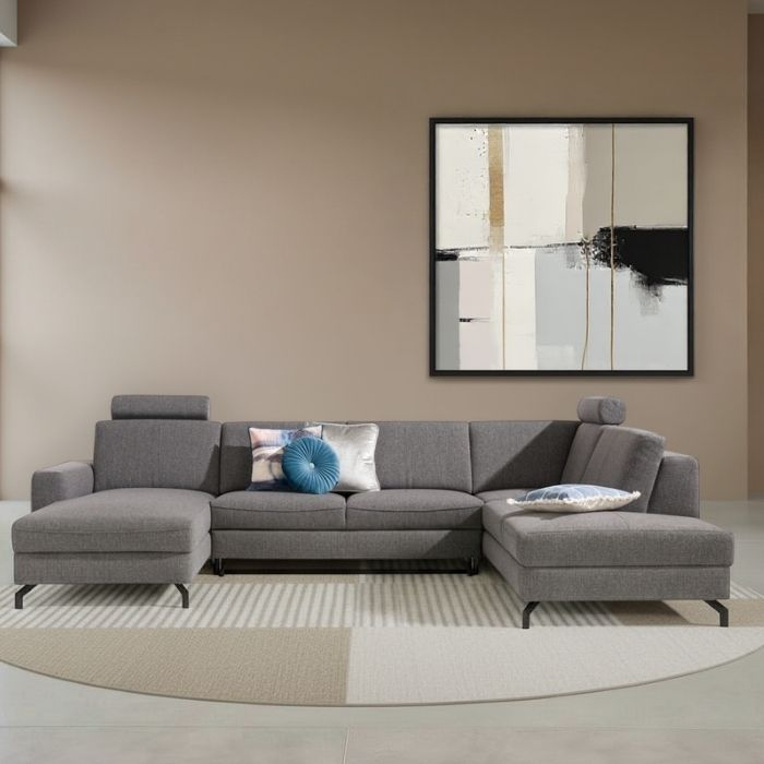 Kingston bank met chaise longue links en ottoman rechts. 