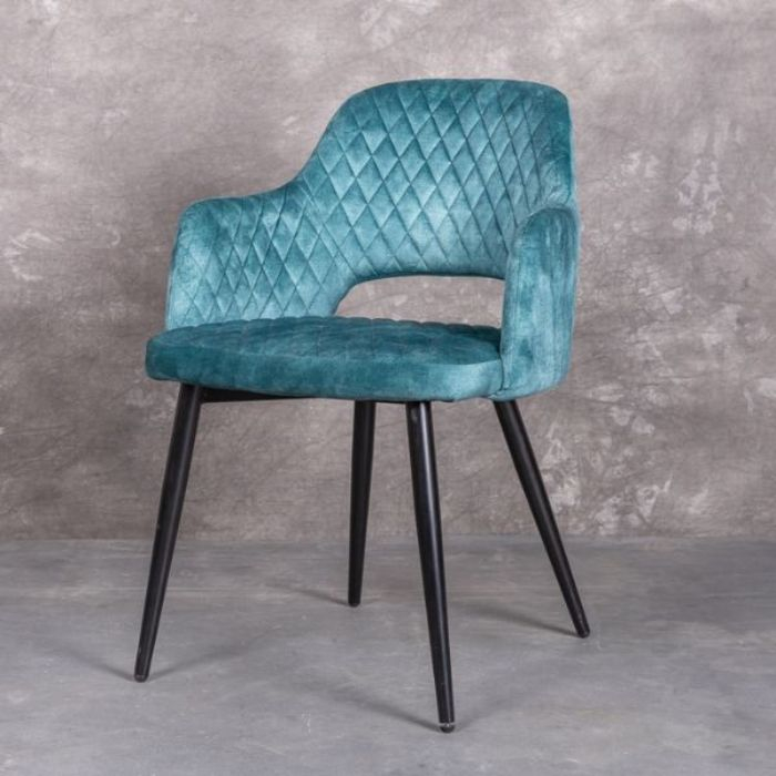 Eetkamerstoel van microvezel in de kleur turquoise. 