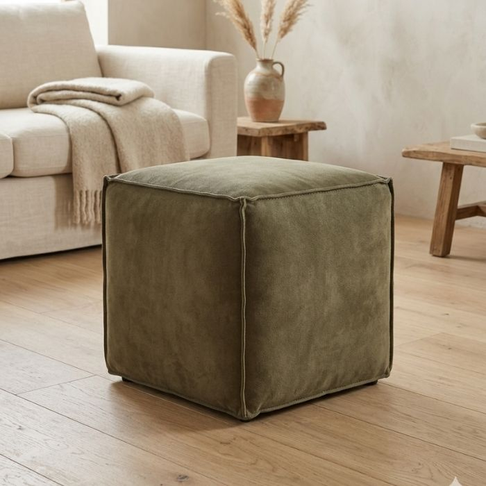 Poef leder in het groen. 